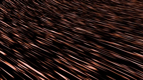 A dynamic stream of copper glowing lines cascades continuously across a dark Video stock 346139219