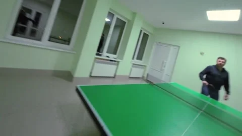 Dynamic Table Tennis POV: Real-Time Gameplay from Player's Paddle Perspective Stock Footage 304424834