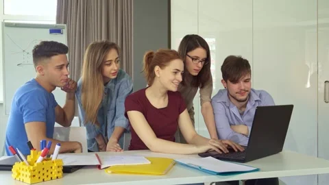 Dynamic teamwork among young professionals in a modern office Stock Footage 311952014