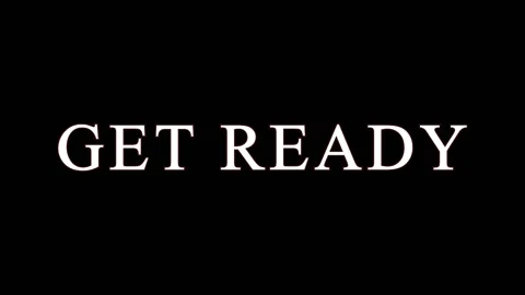 Dynamic text animation GET READY with energetic light streaks during a dark.. Stock Footage 345620470