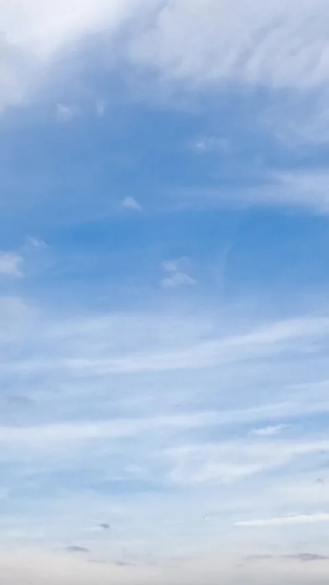 Dynamic time-lapse of ever-changing cloud formations moving across a serene.. Stock Footage 337597782