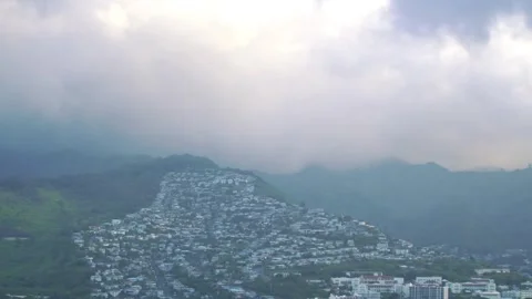 Dynamic time lapse of Honolulu's mountainous backdrop and urban foreground .. Stock Footage 281794430