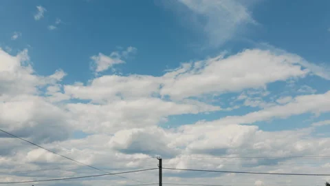 Dynamic time-lapse showing clouds flowing across the clear sky Stock Footage 328327776