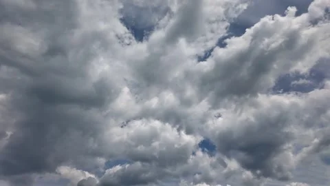 Dynamic Timelapse of Cumulus Clouds Transforming into Stormy Sky Video stock 340631730