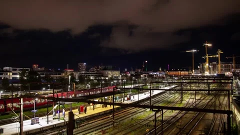 Dynamic Timelapse Featuring Copenhagen's Metro Station on Cloudy Night Stock Footage 312985171