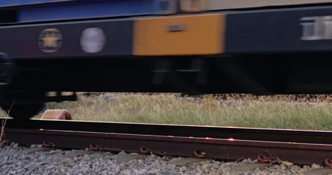 Dynamic train movement in an outdoor rail yard industrial transportation scene Stock Footage 334636138
