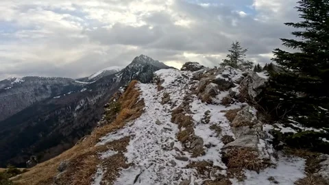 Dynamic Transition from Winter Forest to Open Rock Lookout with Panoramic Stock-Footage 327127336