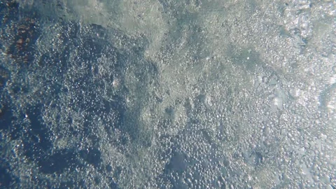 Dynamic underwater scene with cascading rapids and air bubbles in motion Stock Footage 319497713