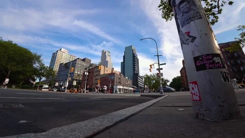 Dynamic urban intersection time-lapse capturing bustling city activity on a Stock Footage 341889236