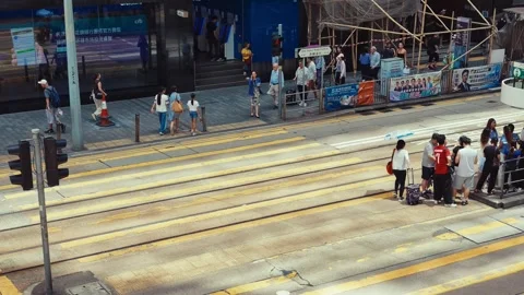 A dynamic urban scene from an elevated perspective showcasing bustling streets Stock-Footage 338311477