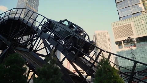 Dynamic Vehicle Showcase Event Featuring Exciting Displays in Urban Environment Vídeo Stock 291625463