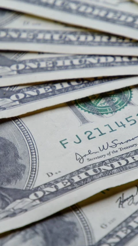 Dynamic Vertical Video Of Spinning Cash Notes Illustrates Income And Economic Video stock 315538619