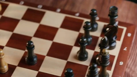 Dynamic video with a chessboard with pieces top view Stock Footage 131082850