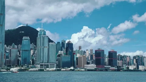 A dynamic video showcases the iconic Hong Kong skyline from a vantage point on 库存影片 338310971