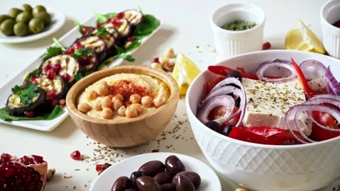 A dynamic video showcasing a variety of traditional mediterranean dishes la.. Stock Footage 339444442