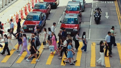 A dynamic view from above capturing the vibrant city life in Hong Kong's busy Stock Footage 338311489