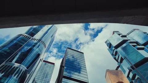 A dynamic view from below showcasing modern Hong Kong skyscrapers and an Stock-Footage 338311557