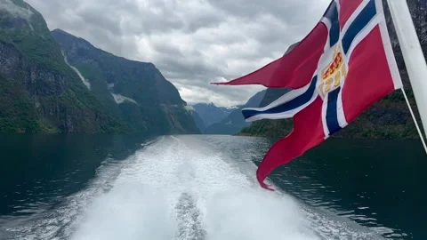 A dynamic view from a boat showcasing a Norwegian flag Video stock 314094677