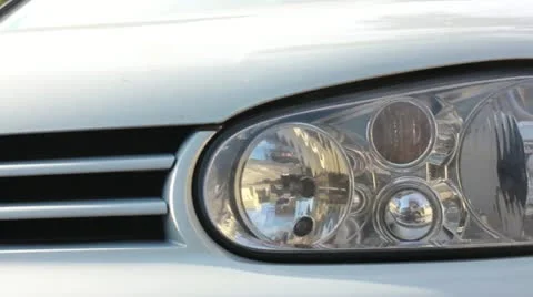 Dynamic view of the luxury car, front view, headlights Vídeo Stock 12398302