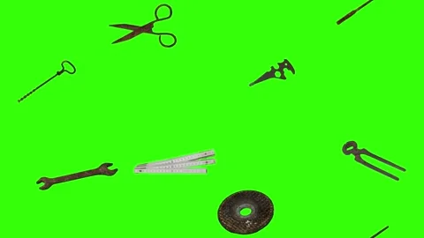 Dynamic vintage tool animation with assorted tools scattered in green background Stockbeeldmateriaal 334567874