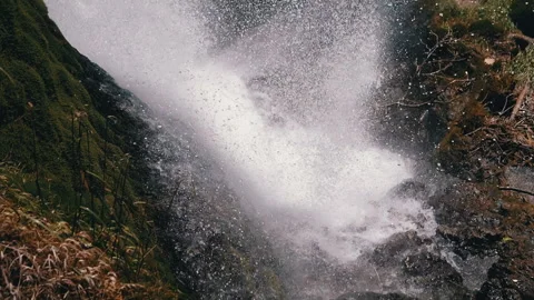 A Dynamic Waterfall Spray Captured Beautifully in Action Amidst Natures Splendor Stock Footage 312524470