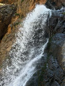 Dynamic Waterfall Stream Cascading Down Rugged Cliffs in Atlas Mountains Stock Photos