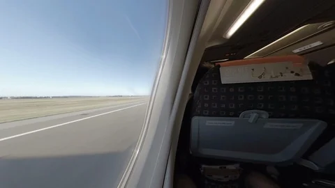Dynamic wide angle view onboard plane as it takes off  Stock Footage 118253010