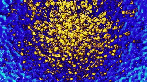 Dynamic yellow drops on a blue background 스톡 동영상 135472658