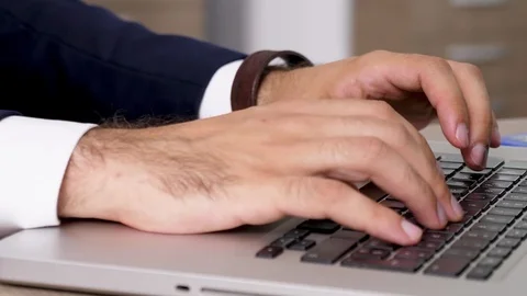 Dynamic zoom in man hands typing fast on computer keyboard Stock Footage 95227068