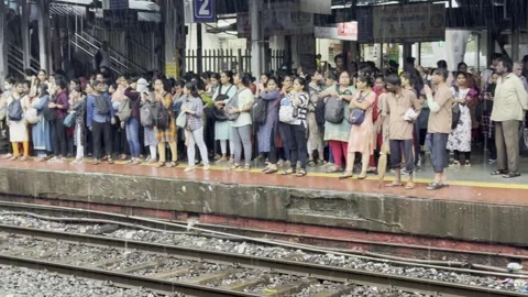The Dynamics of a Busy Railway Platform Crowd: A Closer Look Stock Footage 253255186