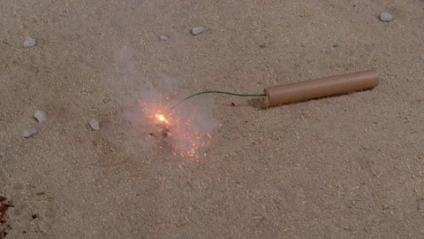Dynamite Cartridge Falls On Sand Stock-Footage 345991181