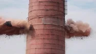 Dynamite Explosion During Demolition Of Abandoned Smoke Stack. Stock Footage
