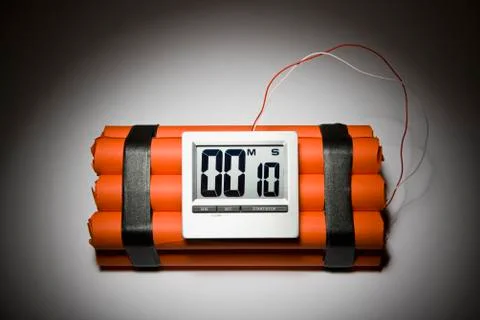 A dynamite time bomb with 10 seconds left on the timer Stock Photos
