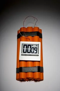 A dynamite time bomb with 9 seconds left on the timer Stock Photos