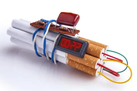 Dynamite time bomb made of Cigarettes Stock Photos