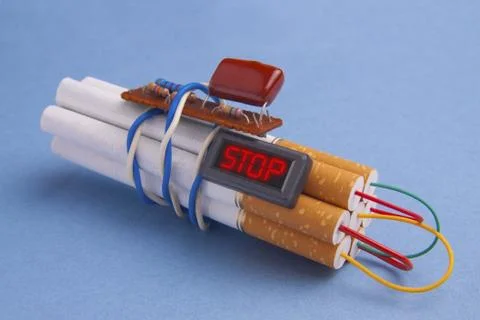 Dynamite time bomb made of Cigarettes Stock Photos