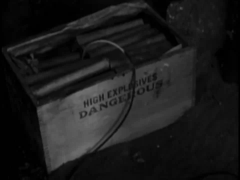 Dynamite in wooden box with burning fuse Stock Footage 260240480