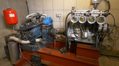 Dynamometer testing a four cylinder engine Stock Footage 100757280