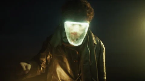 Dystopian character with leather jacket and mask illuminates Stock Footage 327979607