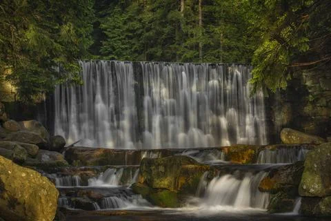 Dziki waterfall in Karpacz town in Krkonose mountains in spring fresh morning Stock Photos