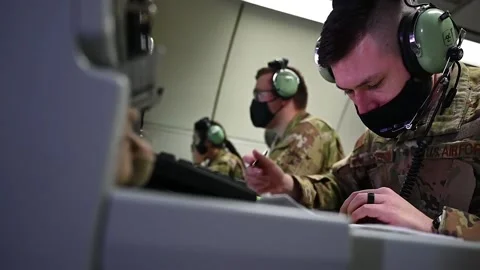 E-3 Sentry flight engineers operating onboard computers Stockbeeldmateriaal 151251016
