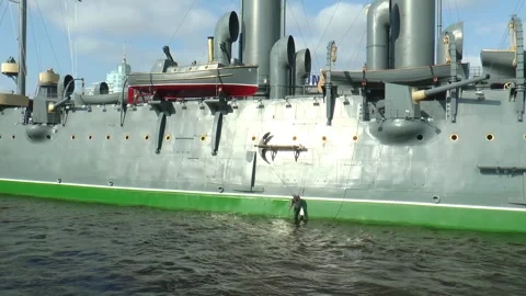 E Aurora at the granite mooring on Neva river Embankment. Stock Footage 340553791