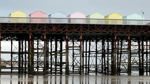 E Beach huts on a pier 4K Video stock 117935271