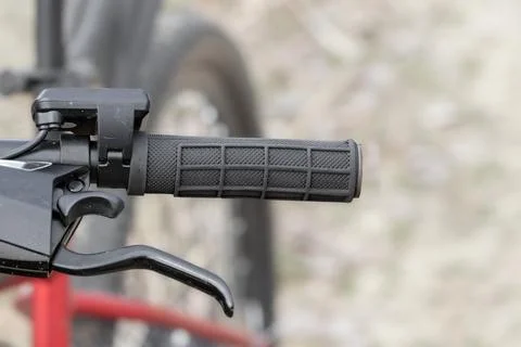E-bike handlebars with digital speedometer. Stock Photos