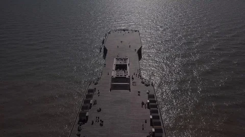 E Board walk pier pull back drone 4K Video stock 117114491