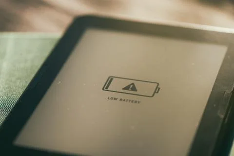 E-book in low battery Stock Photos