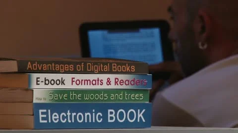 E-book, man with tablet Video stock 11962402