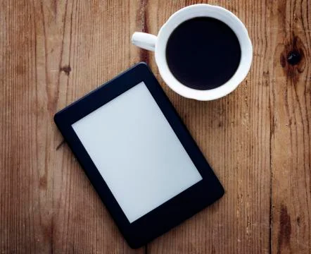 E-book reader and coffee Foto stock