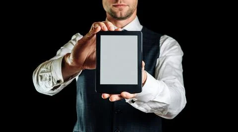 E book reader. Digital book, library reader tablet in business man hand. Conc Stock Photos