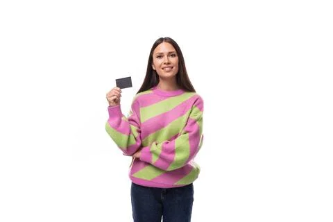 E-business concept. 35 year old feminine model woman dressed in a pink and green Stock Photos